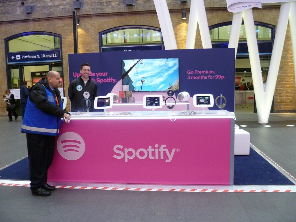 A Spotify promotional stand at King's Cross railway station, London