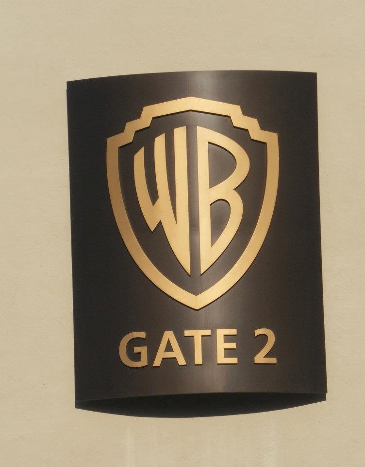 Warner Bros. shield logo on the Gate 2 entrance sign in Burbank