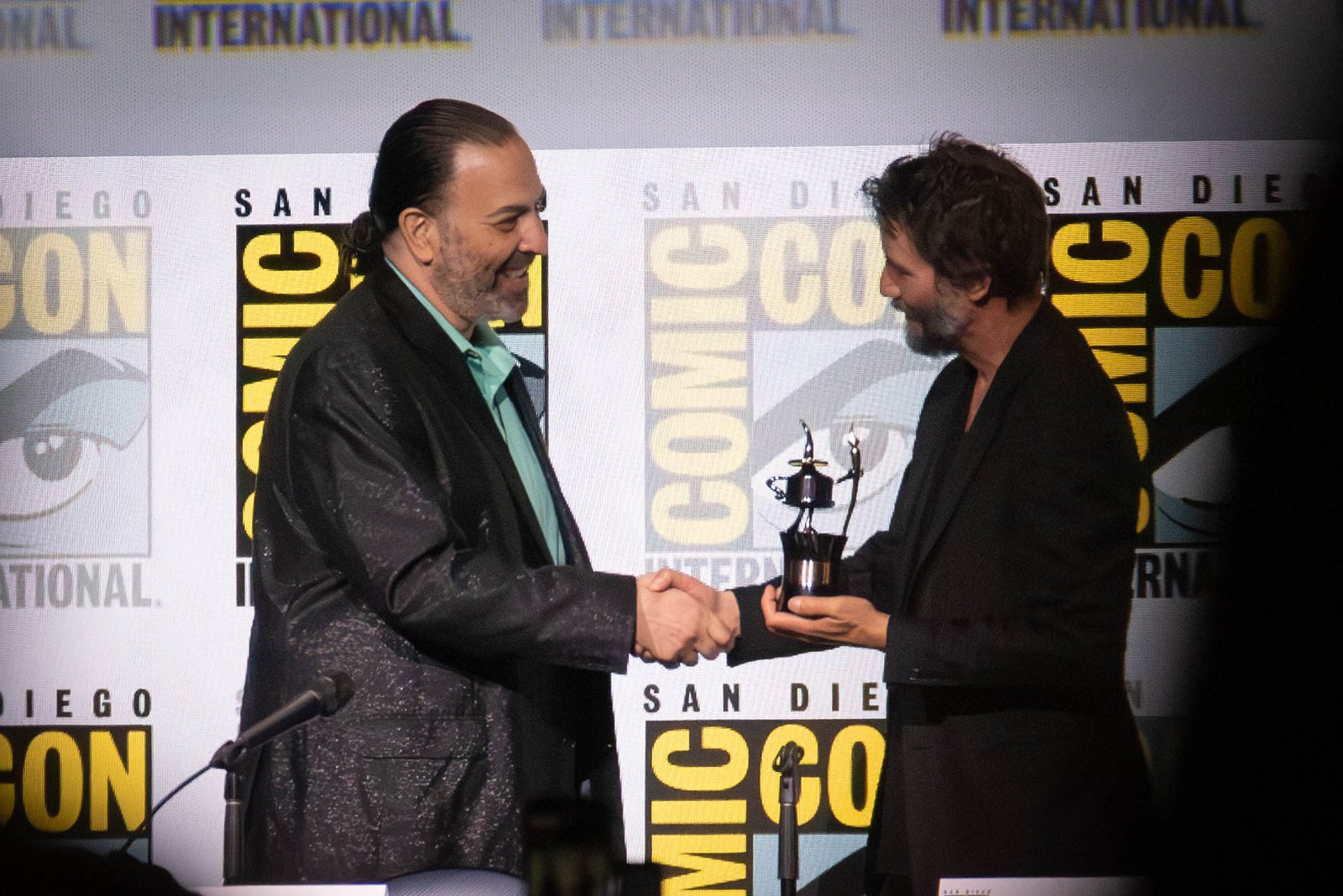Keanu Reeves speaking on a panel at San Diego Comic-Con