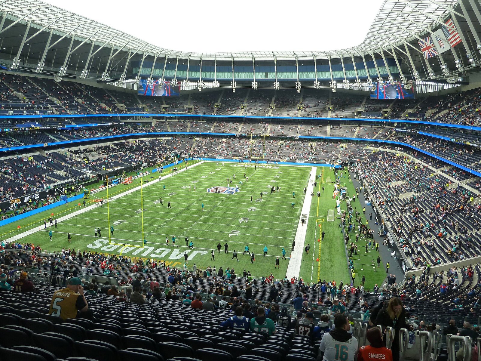 An NFL game in progress at Tottenham Hotspur Stadium in London